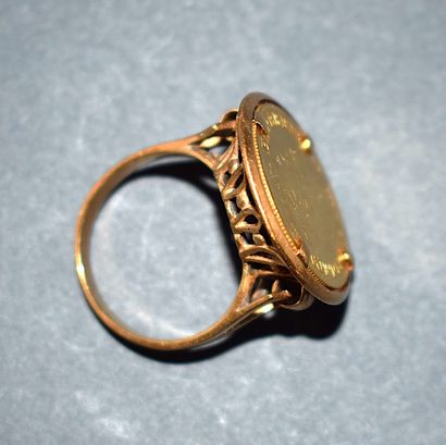 PIECE 10 francs ring in 18K (750/°°) yellow...