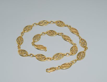 NECKLACE in 18k (750/°°) yellow gold filigree...