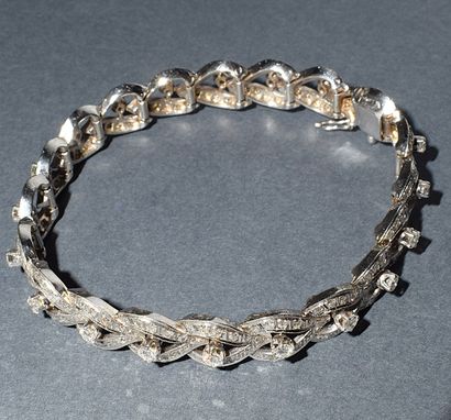 BRACELET rivière in 18k (750/°°) white gold,...