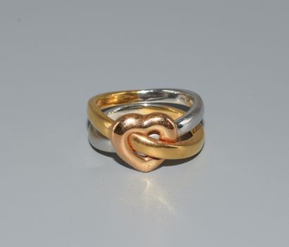 RING in 18K (750/°°) yellow gold forming...