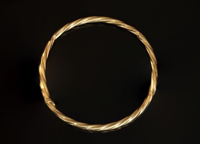 BRACELET JONC creux twisted in 18K (750/°°)...