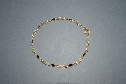BRACELET in 18K (750 /°°) yellow gold, 1/1...