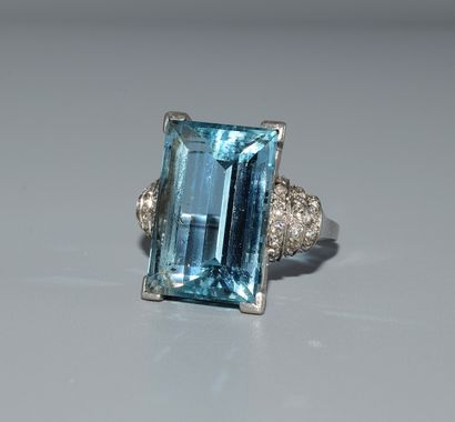 Art Deco platinum ring, centered on a Santa...
