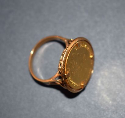 PIECE 10 francs ring in 18K (750/°°) yellow...