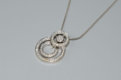18K (750/°°) white gold CHAIN AND PENDANT,...