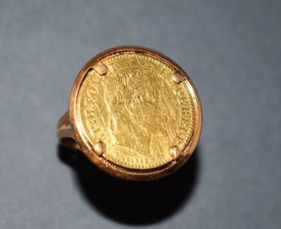 PIECE 10 francs ring in 18K (750/°°) yellow...