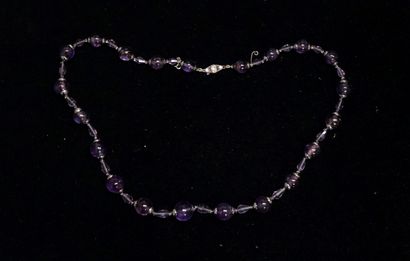 NECKLACE of falling amethyst balls interspersed...