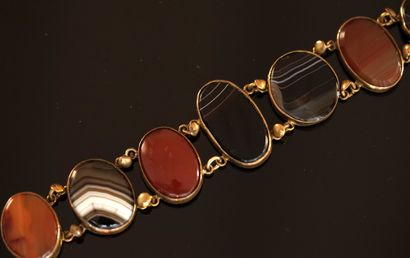 BRACELET in gilded metal, the links embellished...