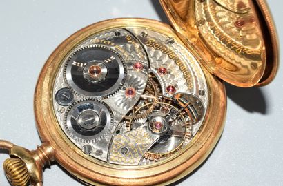 ELGIN - MONTRE GOUSSET en or jaune 14K (585/°°),...