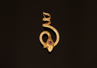 COULANT en or jaune 18k (750/°°) figurant...