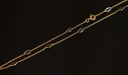 18K (750/°°) yellow gold anklet punctuated...