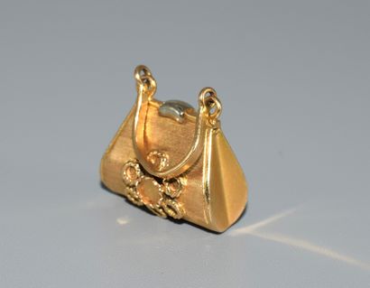 18K (750/°°) yellow and white gold handbag...