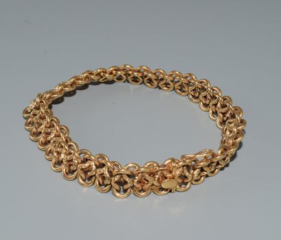 BRACELET in 18K (750/°°) yellow gold with...