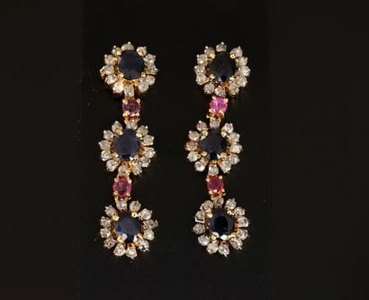 PAIR OF 925/°° gilded silver earrings featuring...