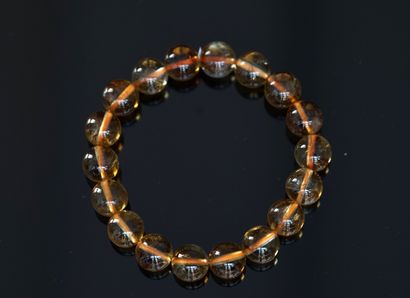 BRACELET composé de perles ronde de citrine,...