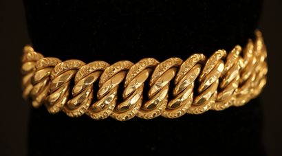 BRACELET in 18K (750/°°) yellow gold. Width...