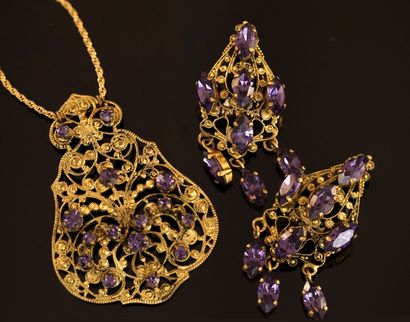 In the taste of Woloch, set in gilded metal...