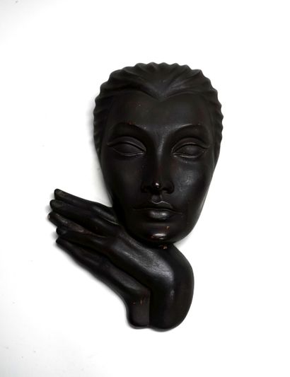 Woman's MASK in black-brown painted plaster....