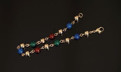 BRACELET en plaqué or composé de boules alternées...