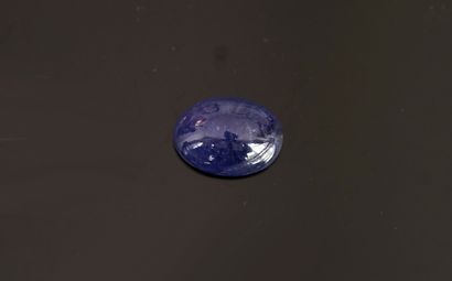 TANZANITE oval cabochon on paper, 13cts approx....