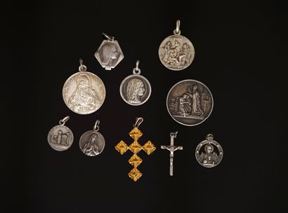 SET in silver min 800/°° comprising 7 religious...