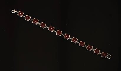 BRACELET in 925/°° silver, each link punctuated...