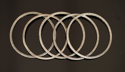 SET of 5 rigid JONC BRACELETS set with colorless,...
