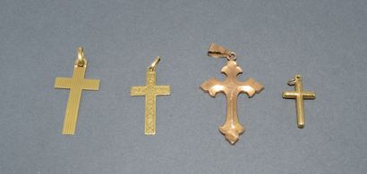 SET OF 4 CROSSES in 18K (750/°°) yellow gold....
