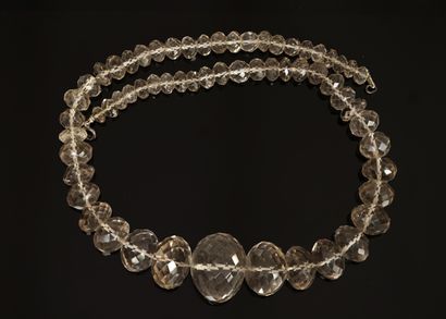 COLLAR of round faceted beads of lightly...