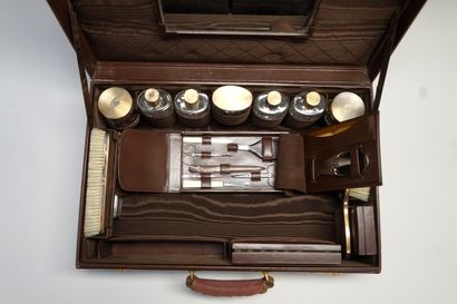 CARTIER - Brown leather TOILETTE CASE including...