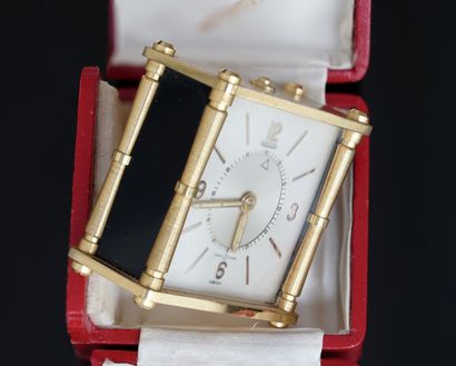 JAEGER - TRAVEL ALARM CLOCK in gilt metal...