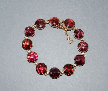 BRACELET in 18K (750/°°) yellow gold, horse...