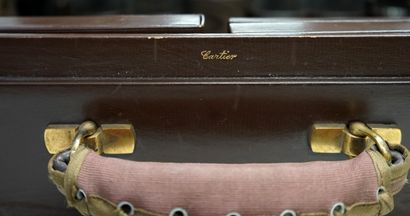 CARTIER - Brown leather TOILETTE CASE including...