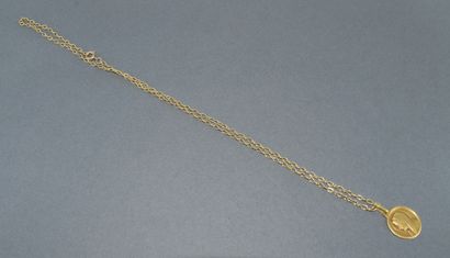CHAIN AND MEDAL in 18K (750°°) yellow gold...