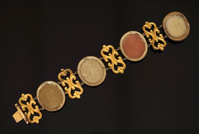 Articulated pomponne BRACELET featuring 4...