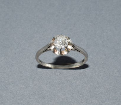 SOLITARY in platinum with dog's head hallmark,...