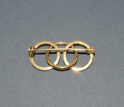 BROCHE en or jaune 18k (750/°°) poinçon tête...
