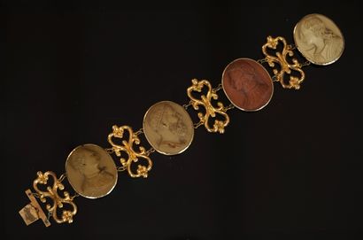 Articulated pomponne BRACELET featuring 4...