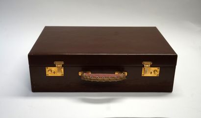 CARTIER - Brown leather TOILETTE CASE including...