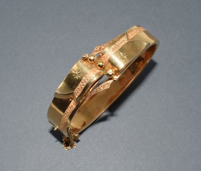 BRACELET JONC RUBAN en or jaune 18K (750/°°)...