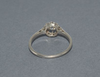 SOLITARY in platinum with dog's head hallmark,...