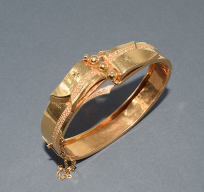 BRACELET JONC RUBAN en or jaune 18K (750/°°)...