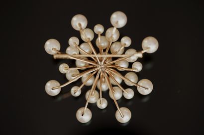 14K (585/°°) yellow gold shell-marked sun-shaped...