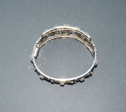 BRACELET jonc ouvrant en or blanc 18K (750/°°)...
