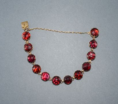 BRACELET in 18K (750/°°) yellow gold, horse...