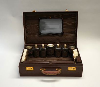 CARTIER - Brown leather TOILETTE CASE including...