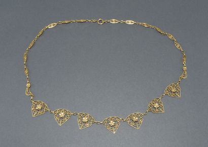 COLLIER DRAPERIE en or jaune 18K (750/°°)...