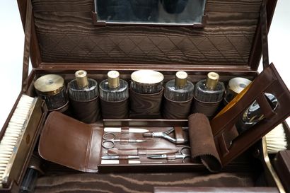 CARTIER - Brown leather TOILETTE CASE including...