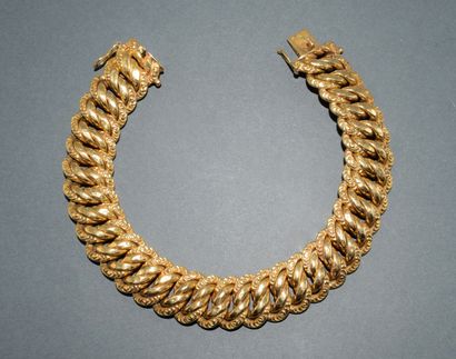BRACELET en or jaune 18K (750/°°), poinçon...