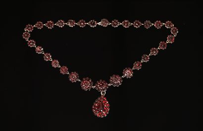 silver necklace with flower-shaped links,...